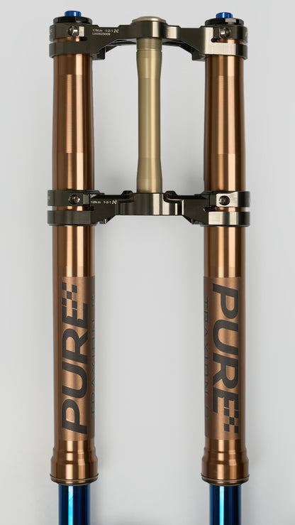 Pair of Pure suspension forks on a white background